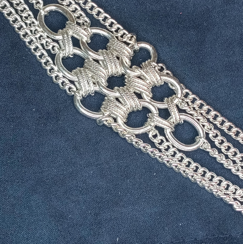 Silver color bracelet. Unique design